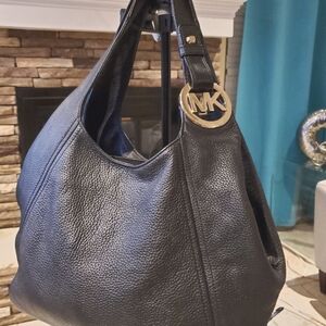 Black leather  Michael  Kors purse